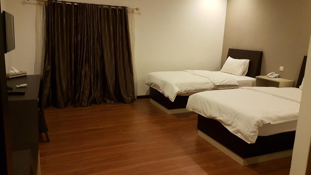 Kampoeng Nelayan Hotel Палу Номер фото